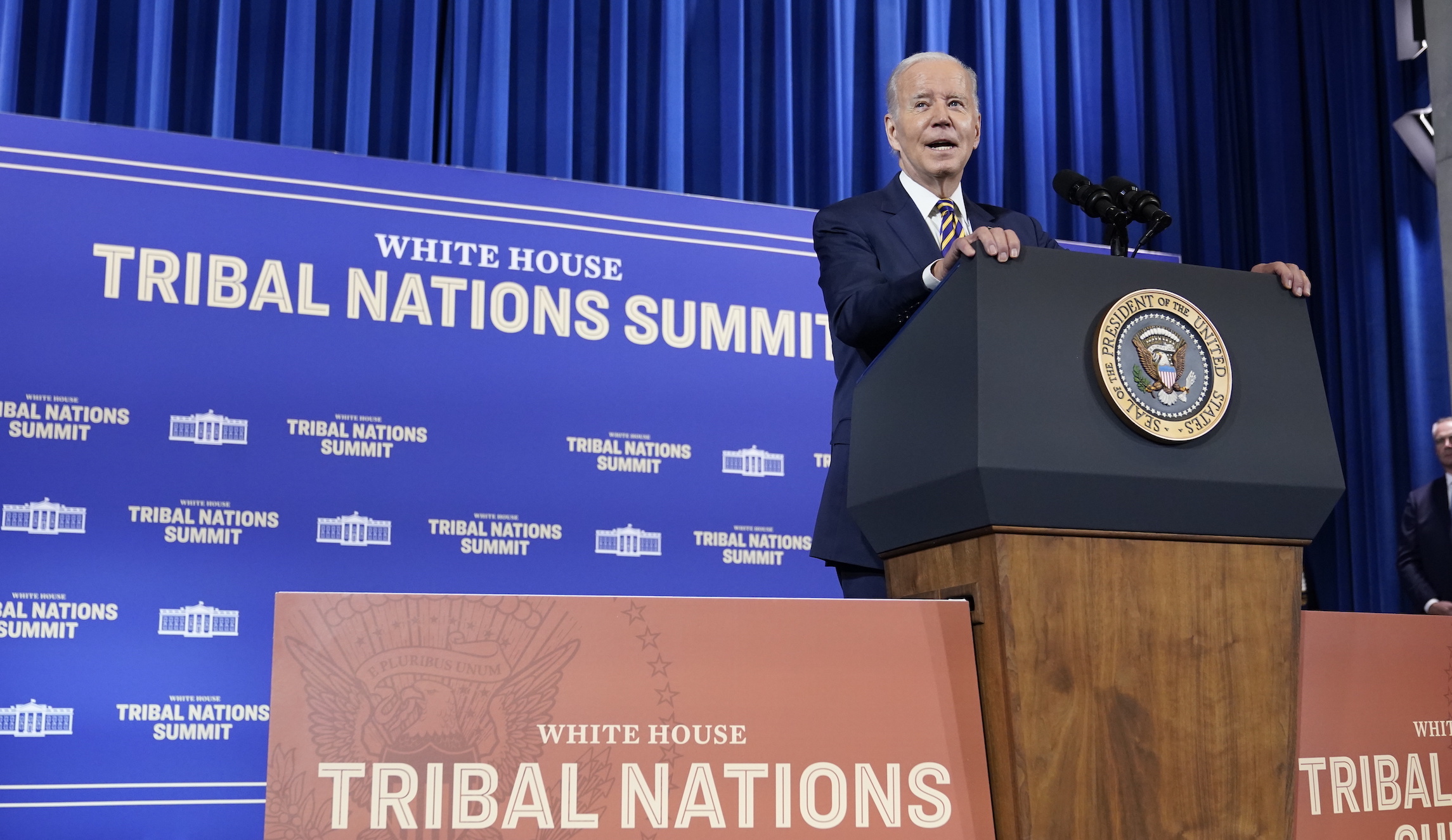 Biden speaks at Tribal Nations Summit as native communities sue his administration
