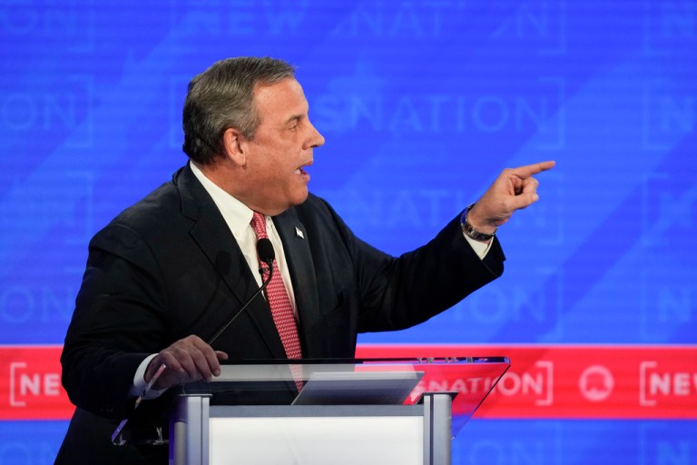 Former New Jersey Gov. Chris Christie gesturing toward businessman Vivek Ramaswamy during a Republican presidential primary debate hosted by NewsNation on Wednesday, Dec. 6, 2023, at the Moody Music Hall at the University of Alabama in Tuscaloosa, Alabama.