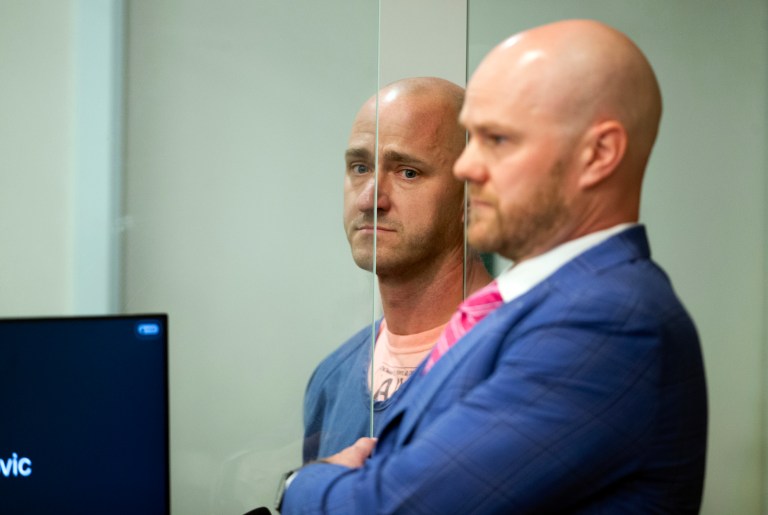 FILE - Joseph Emerson, left, is arraigned in Multnomah County Circuit Court on Oct. 24, 2023, in Portland, Oregon. The ex-Alaska Airlines pilot accused of trying to cut the engines of a passenger flight while off-duty and riding in an extra seat in the cockpit can be released from jail pending trial, an Oregon judge said Thursday, Dec. 7.