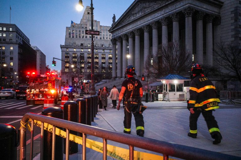 New York firefighters walk up to the entrance of New York Supreme Court, Dec. 13, 2023, in New York. The courthouse in New York City where former President Donald Trump's civil business fraud trial has been taking place was evacuated on Wednesday hours after testimony had concluded for the day.