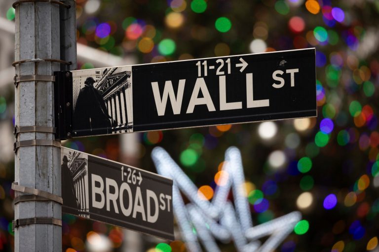 Dow Jones closes at all-time high after Powell signals interest rate cuts
