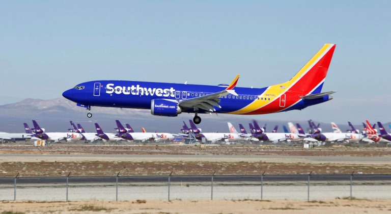 FILE - A Southwest Airlines Boeing 737 Max aircraft lands at the Southern California Logistics Airport on March 23, 2019, in Victorville, California. (AP Photo/Matt Hartman, File)