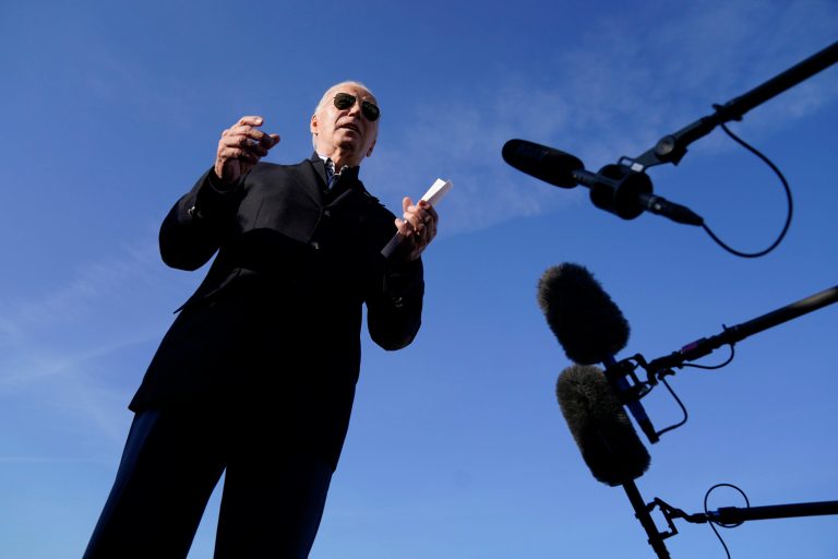 President Joe Biden speaks to members of the media before boarding Air Force One at Milwaukee Mitchell International Airport, Wednesday, Dec. 20, 2023, in Milwaukee. 