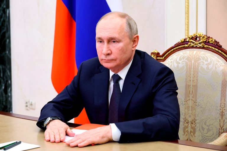 Russian President Vladimir Putin chairs a meeting with members of the Security Council via a video conference at the Kremlin in Moscow, Russia, Friday, Dec. 22, 2023. 