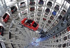 SEE IT: Scientists glue themselves to the floor of a Volkswagen exhibit hall