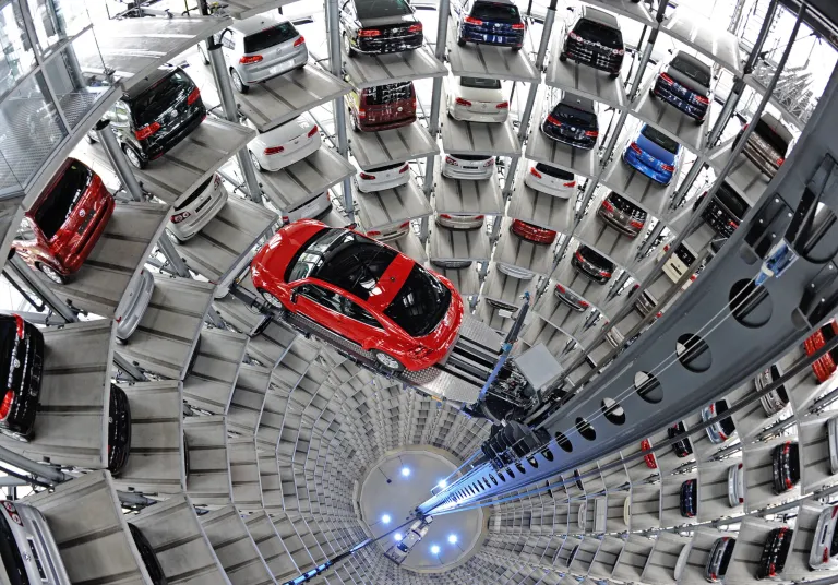 SEE IT: Scientists glue themselves to the floor of a Volkswagen exhibit hall