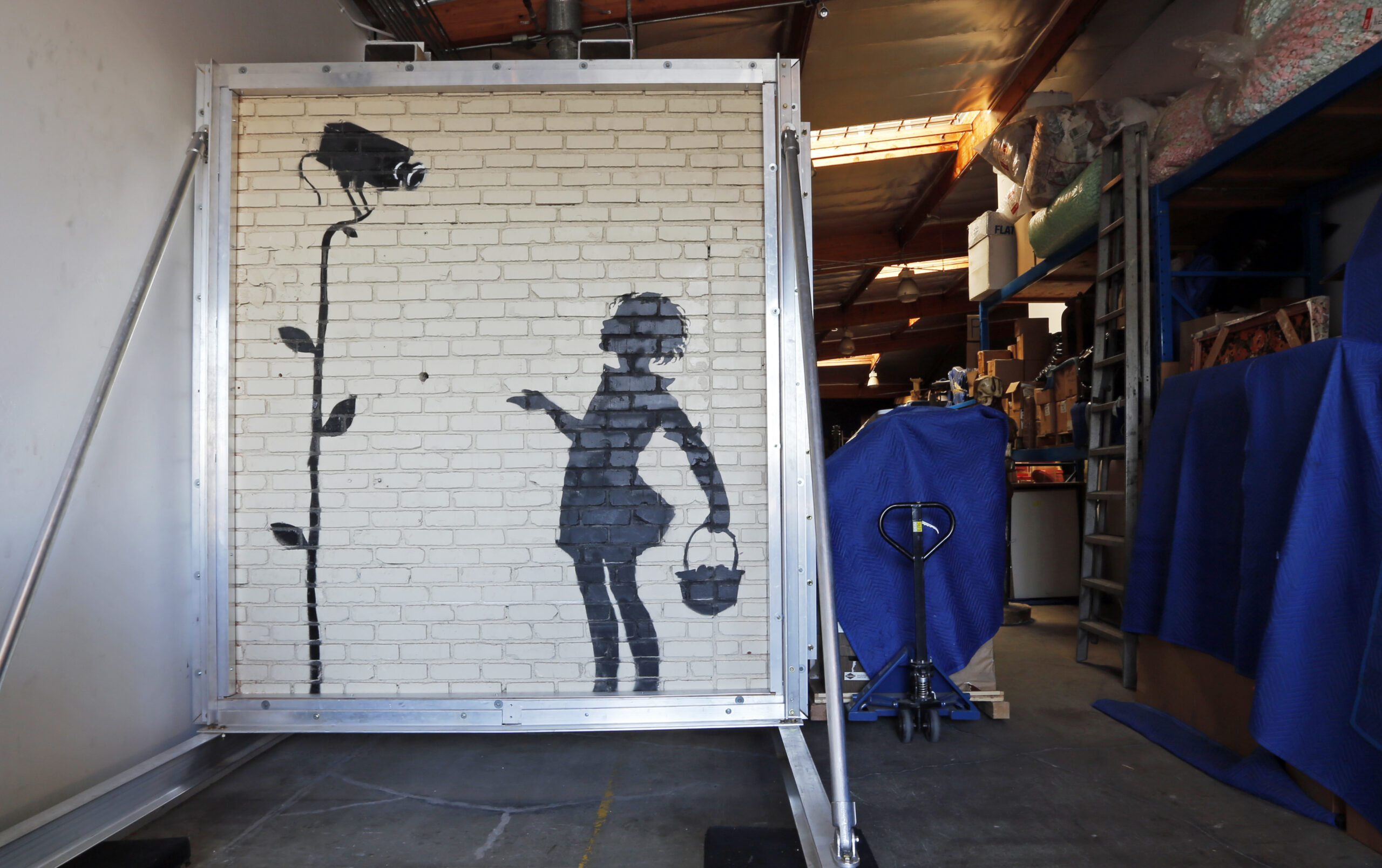 Wall art with building attached to be auctioned off in Los Angeles