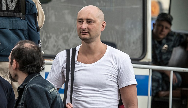 Russian journalist Arkady Babchenko, 41, who had been reported shot and killed in the Ukrainian capital Tuesday, has shown up at a news conference very much alive. Head of the Ukrainian Security Service told a news conference on Wednesday May 30, 2018 the agency faked Babchenko's death to catch those who were trying to kill him.  