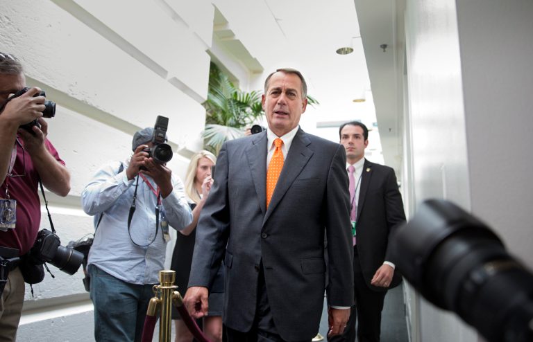 Speaker of the House John Boehner, R-Ohio, returns to his office after a meeting with House Republicans at the Capitol in Washington, Wednesday, Oct. 16, 2013. Earlier, Senate leaders reached a last-minute agreement to avert a threatened Treasury default and reopen the government after a partial, 16-day shutdown. (AP Photo/J. Scott Applewhite)