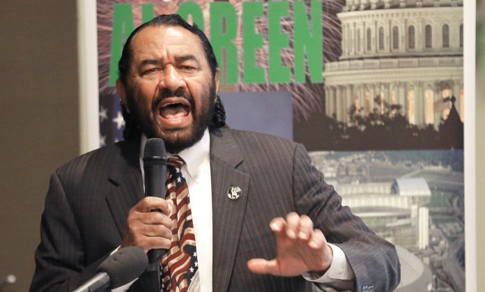 The president is playing politics of the lives of the Puerto Rican people," said Rep. Al Green. (AP Photo/Pat Sullivan)