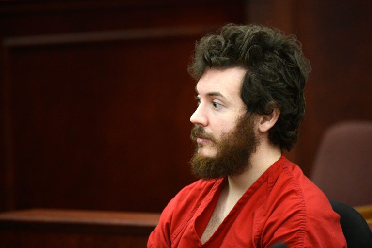 FILE - This March 12, 2013 file photo shows James Holmes, Aurora theater shooting suspect, in the courtroom during his arraignment in Centennial, Colo. Lawyers for Holmes are objecting to a Fox News reporter's request to delay her court appearance to testify about her confidential sources, Tuesday, March 27, 2013. (AP Photo/Denver Post, RJ Sangosti, Pool)