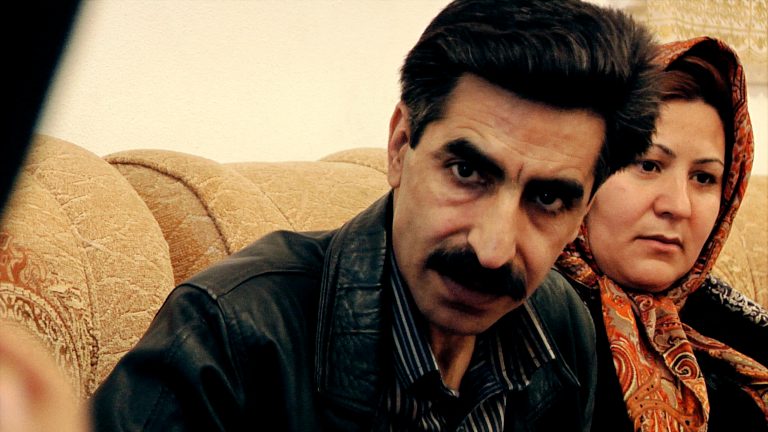 This photo provided by the Sundance Institute shows Hadi, left, and mother, in the documentary film, 