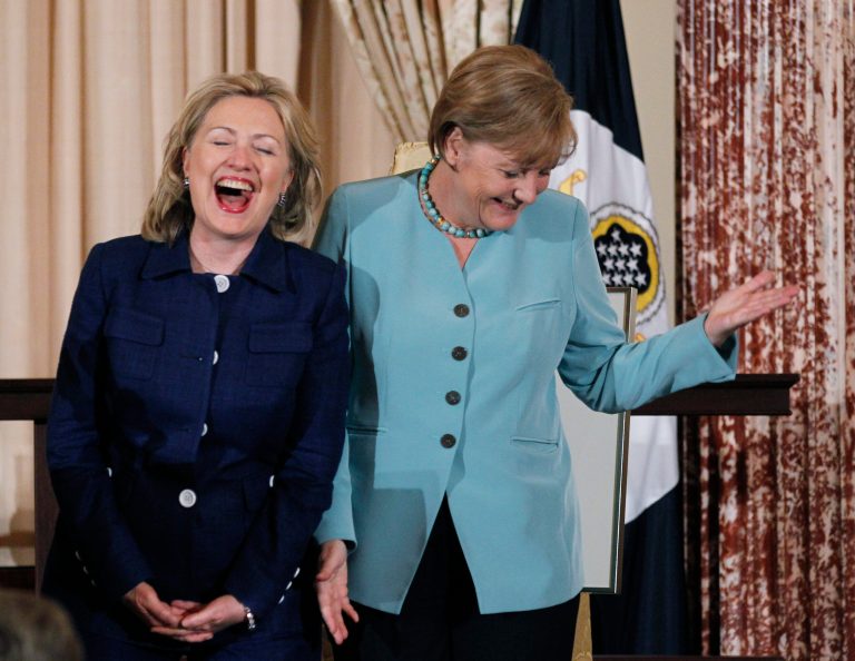 Secretary of State Hillary Rodham Clinton, left, and German Chancellor Angela Merkel laugh during a State Luncheon in honor of the German chancellor at the State Department in Washington, Tuesday, June 7, 2011. (AP Photo/Manuel Balce Ceneta)