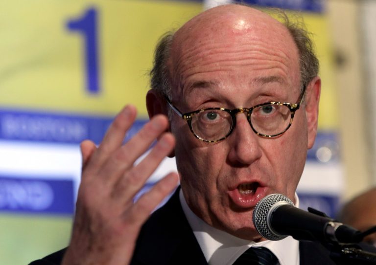 FILE - In this April 23, 2013 file photo, Kenneth Feinberg, an attorney who managed the 9/11 Victim Compensation Fund, speaks during a news conference in Boston. Feinberg, hired by General Motors to settle claims from a deadly ignition switch problem, has started talks about compensating victims' families. (AP Photo/Elise Amendola, File)