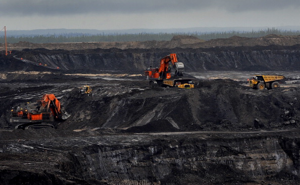 The Shell Oil Jackpine open pit mine uses trucks that are 3 stories tall, weigh one million pounds, and cost 7 million dollars each. (Photo by Michael S. Williamson/The Washington Post via Getty images)
