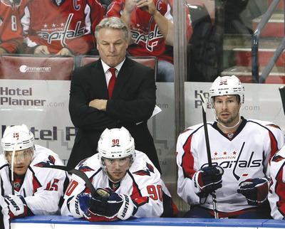 Wilfredo Lee/AP
Dale Hunter went 30-23-7 and led the Capitals to the second round of the Stanley Cup playoffs in his only season in Washington.