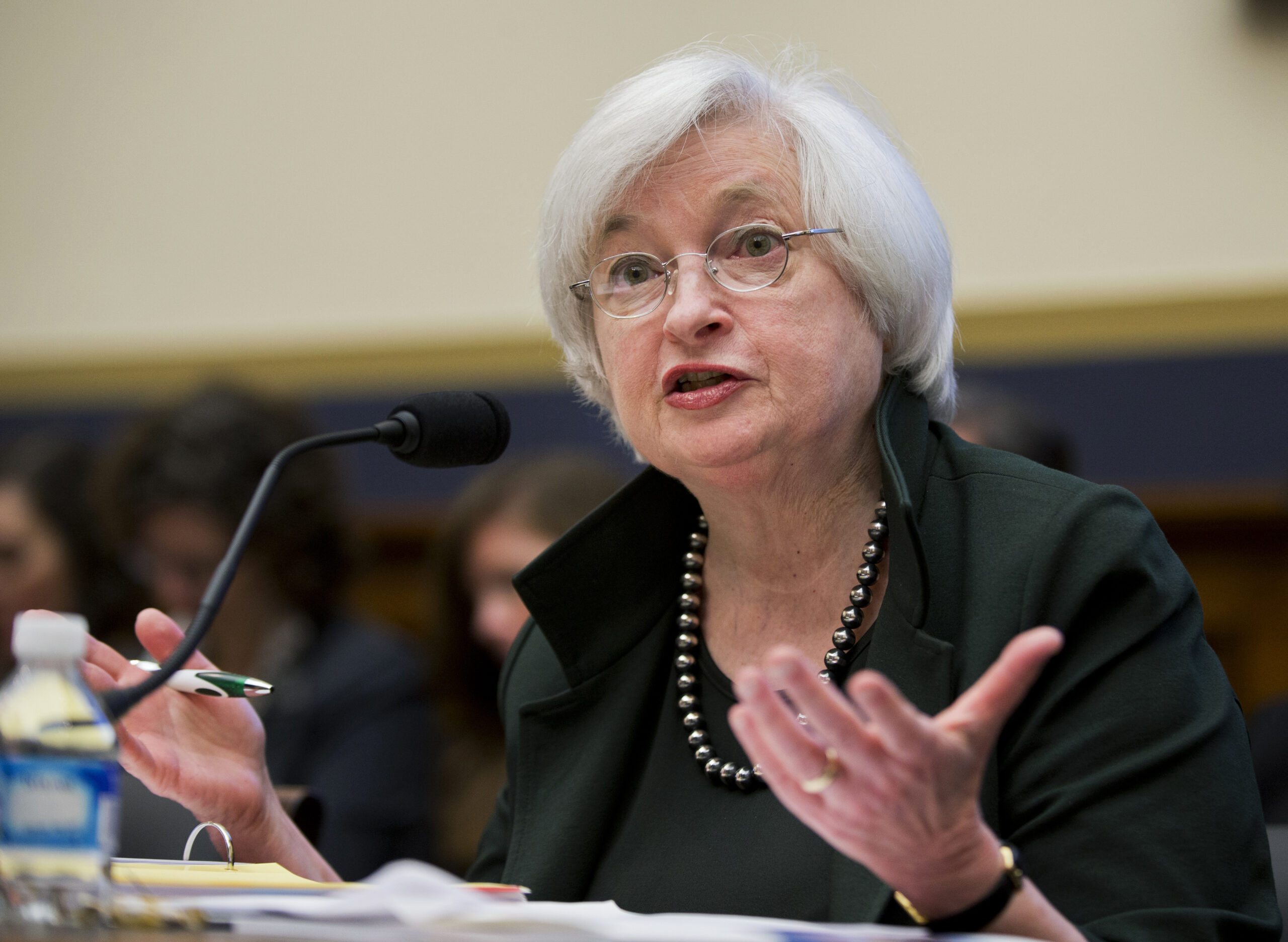 Fed officials lower growth projections
