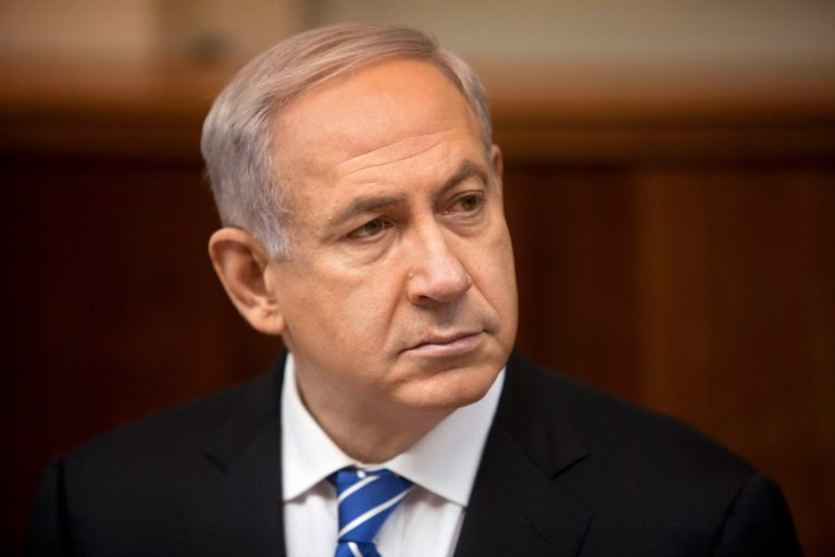 File - In this March 10, 2013 file photo, Israeli Prime Minister Benjamin Netanyahu attends the weekly cabinet meeting in his Jerusalem office. Netanyahu held out the possibility on Thursday, April 18, 2013 of arming Syrian rebels, saying in a televised interview that the decision on whether to intervene in the civil war is a 