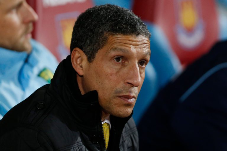 FILE - In this Tuesday, Feb. 11, 2014, file photo, Norwich City's manager Chris Hughton looks on from the dugout before the start of their English Premier League soccer match against West Ham United at Upton Park, London. The Premier League club fired Hughton because it is petrified of a costly relegation. After losing to West Bromwich on Saturday, the team is five points above the relegation zone with five matches remaining, Delia Smith, the co-owner who made her name and fortune from cook books and television shows, will fear missing out on at least $60 million in television revenue next season in the second tier. (AP Photo/Sang Tan, File)