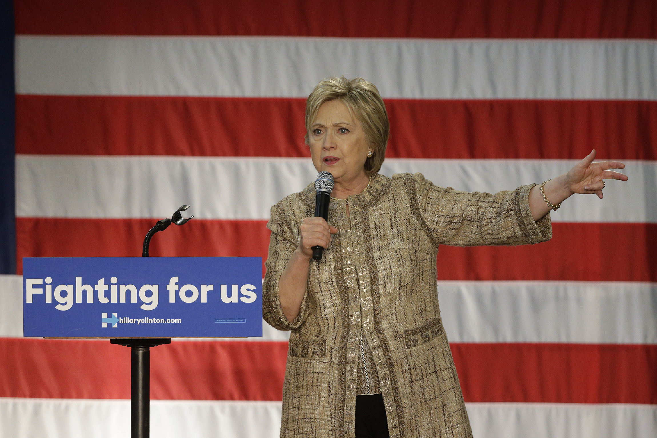 Clinton pushes gun control, slams Sanders in New York City events