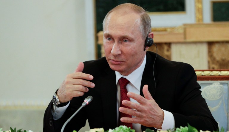 Russian President Vladimir Putin said Thursday that the Russian government has never been involved in hacking. (AP Photo/Dmitri Lovetsky)