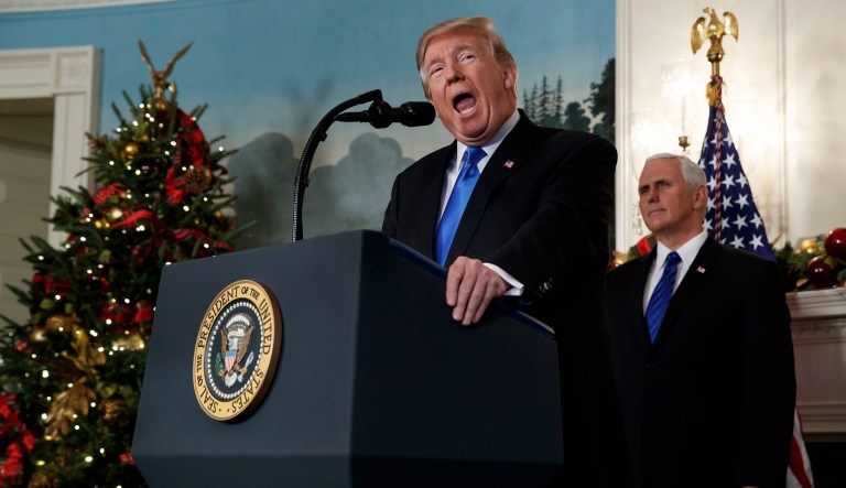 Vice President Mike Pence listens as President Trump delivers a statement to officially recognize Jerusalem as the capital of Israel, in the Diplomatic Reception Room of the White House, Wednesday, Dec. 6, 2017, in Washington. (AP Photo/Evan Vucci)