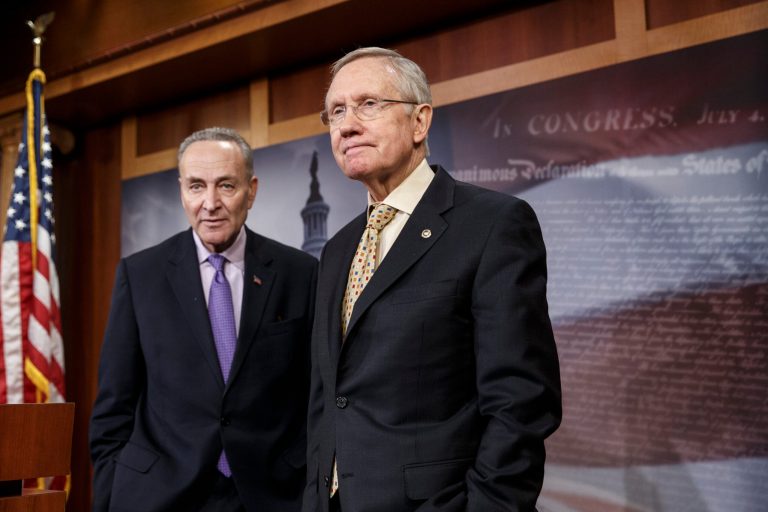 Senate Majority Leader Harry Reid, D-Nev., and Sen. Chuck Schumer, D-N.Y., left, the Democratic Policy Committee chairman, meet with reporters at the Capitol in Washington, Thursday, Jan. 9, 2014. (AP Photo/J. Scott Applewhite)