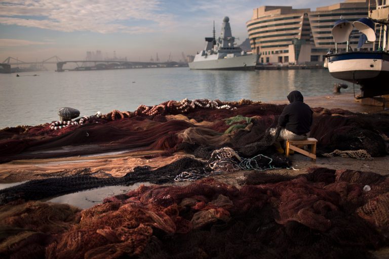   In front of the Mediterranean sea, a fisherman works fixing his net at the fishing port of Barcelona, Spain, Thursday, Dec. 13, 2012. The European Unionâs executive Commission is calling for a new approach to protect dwindling fishery stocks and eliminate a system of setting catch quotas in which scientific advice is widely disregarded. The WWF wildlife group produced a report Friday highlighting how EU nations have exceeded scientific advice in all but 13 percent of their decisions on setting fisheries quotas over the past nine years. (AP Photo/Emilio Morenatti)  
