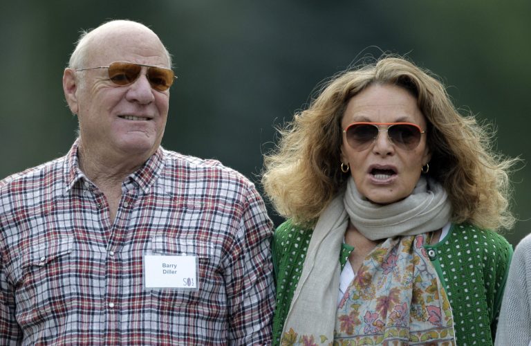   Fashion designer Diane von Furstenberg and her husband, media executive Barry Diller, arrive at the Allen & Company Sun Valley Conference in Sun Valley, Idaho. Diller is stepping down as chairman of TripAdvisor after selling his stake in the travel website to Liberty Interactive. Liberty Interactive bought 4.8 million shares of TripAdvisor Inc.'s common stock from Diller and The Diller-von Furstenberg Family Foundation for a total of about $300 million, making it the travel website's new majority shareholder. (AP Photo/Paul Sakuma)  