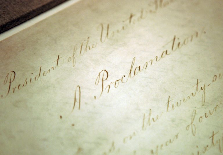   FILE - This Feb. 18, 2005 file photo shows the original Emancipation Proclamation on display in the Rotunda of the National Archives in Washington. As New Year's Day approached 150 years ago, all eyes were on President Abraham Lincoln in expectation of what he warned 100 days earlier would be coming _ his final proclamation declaring all slaves in states rebelling against the Union to be 