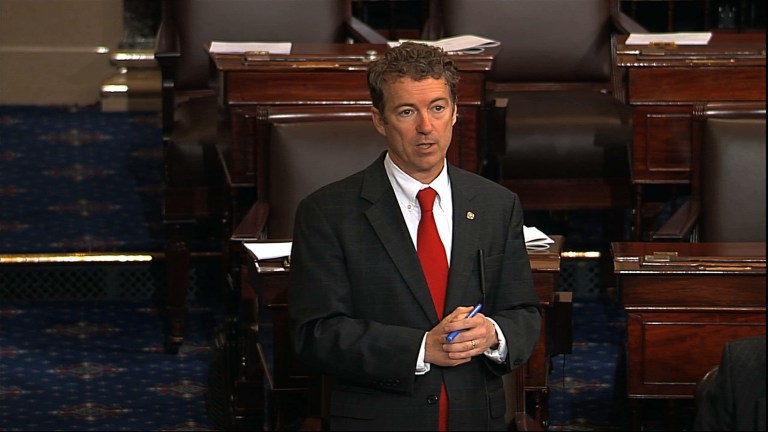 This video frame grab provided by Senate Television shows Sen. Rand Paul, R-Ky. speaking on the floor of the Senate on Capitol Hill in Washington, Wednesday night, March 6, 2013, shortly before 10 p.m. EST. Paul was still going strong with his self-described filibuster blocking confirmation of President Barack Obama's nominee John Brennan to lead the Central Intelligence Agency. (AP Photo/Senate Television)
