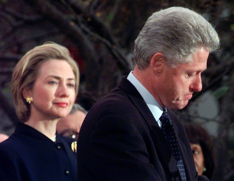 Then-first lady Hillary Rodham Clinton watches then-President Clinton pause as he thanks those Democratic members of the House of Representatives who voted against impeachment in this Dec. 19, 1998 file photo. (AP/Susan Walsh)
