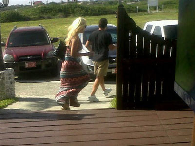 In this picture released Wednesday Aug. 24, 2011 by the Office of the Public Prosecutor of Aruba, missing American tourist Robyn Gardner, left, and her travel companion Gary V. Giordano leave the 