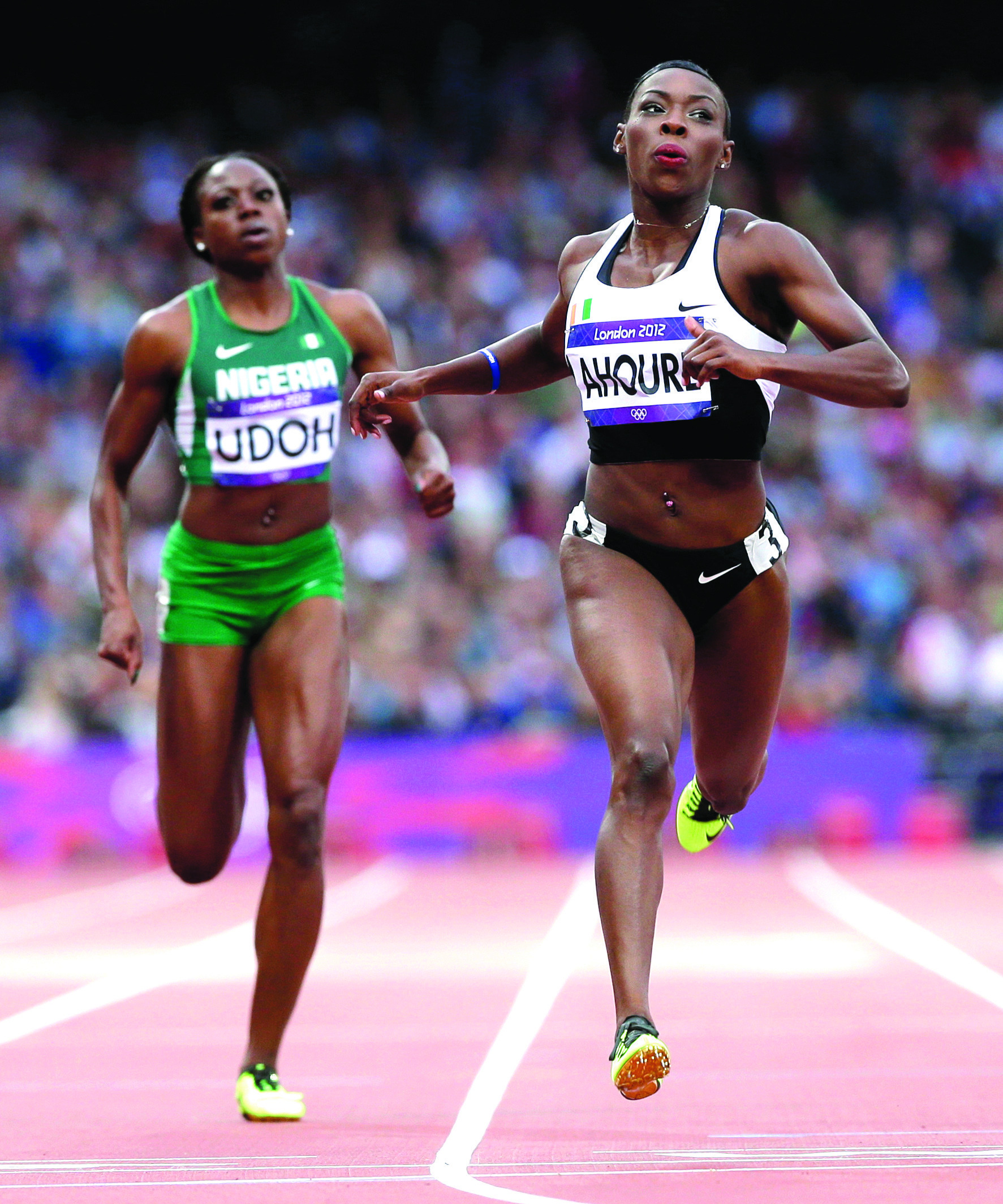Ivory Coast sprinter with local ties advances to 200-meter final