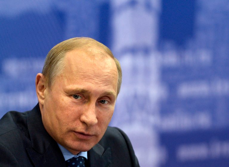 Ultimate responsibility for the massacre of the 298 people aboard Malaysian Airlines Flight MH17 begins and ends in the Kremlin office of Russian president Vladimir Putin. (AP/RIA-Novosti, Alexei Nikolsky)