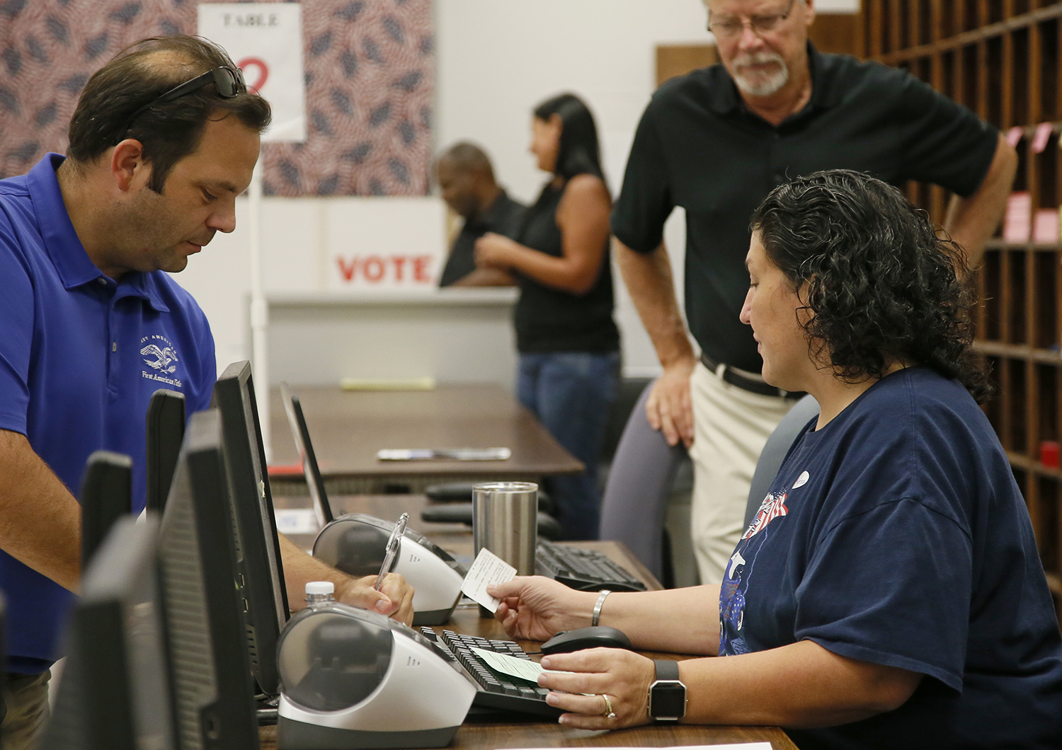 Civil rights panel calls all voter ID laws discriminatory