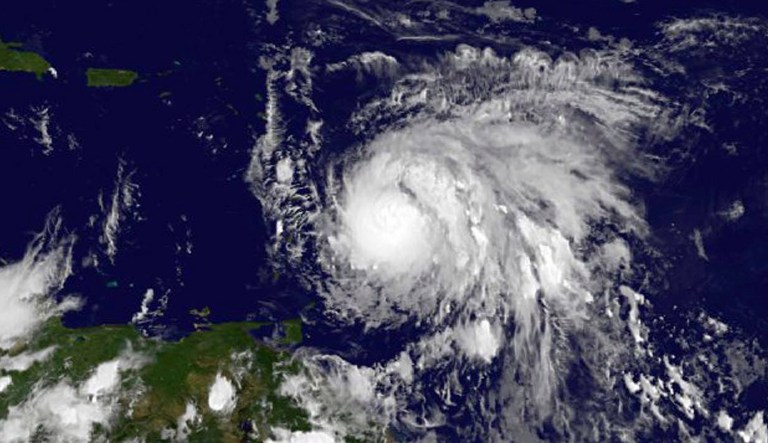 Hurricane Maria swiftly grew into a hurricane Sunday, and forecasters said it was expected to become much stronger over the coming hours following a path that would take it near many of the islands wrecked by Hurricane Irma and then on toward Puerto Rico, the Dominican Republic and Haiti. (NASA via AP)