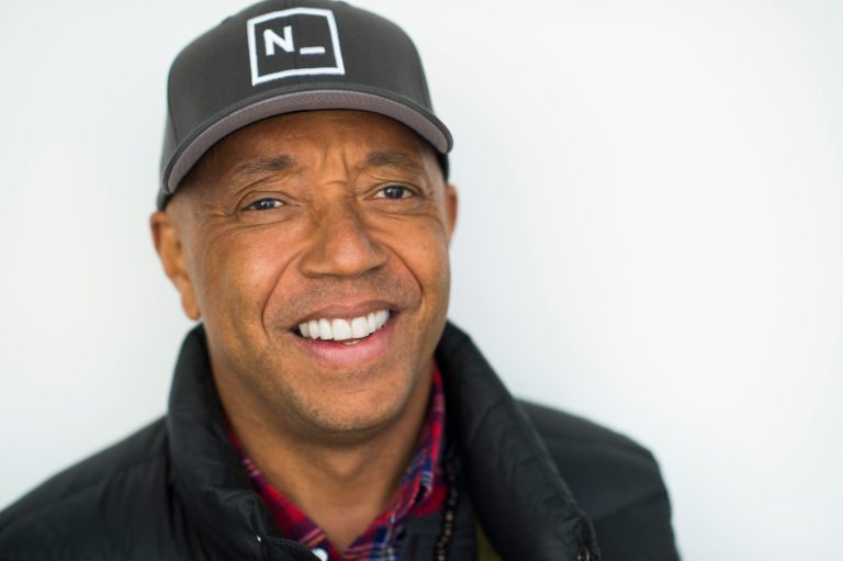 Simmons, who cofounded Dej Jam Records, calling Clinton a longtime friend and slammed her rival, Bernie Sanders. (Photo by Scott Gries/Invision/AP)