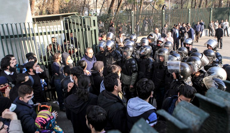 In this photo, anti-riot Iranian police prevent university students from joining other protesters over Iran's weak economy on Dec. 30, 2017. It is up to the international community to step up for the rights of the protesters who linger in the Iranian regime's prisons, a responsibility it has not yet fulfilled. (AP Photo)