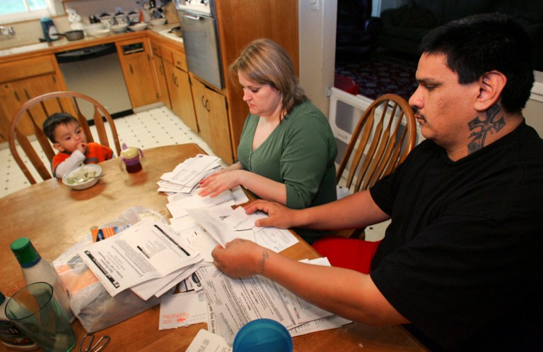 On top of income tax, residents of all but three states (Montana, New Hampshire and Oregon) also must pay sales tax. (AP Photo/Gary Kazanjian)