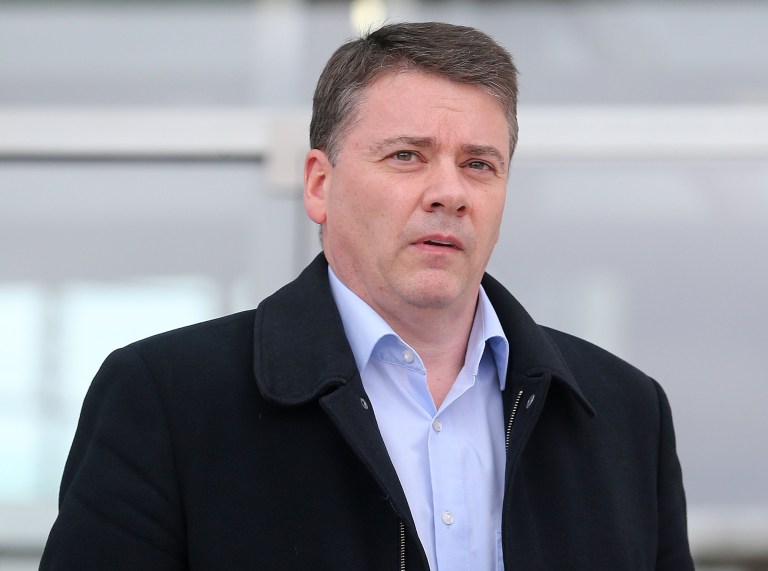 Former Anglo Irish Bank executive lending director Pat Whelan leaves the Circuit Criminal Court, Dublin, Wednesday April 9, 2014, where he stands trial with others facing 42 charges of secretly lending more than 500 million euros ($700 million) to top clients for them to buy Anglo's sagging shares in 2008. Anglo's former managing director of lending Pat Whelan, has been found not guilty on seven separate fraud charges, the court heard Wednesday. (AP Photo /Niall Carson, PA) UNITED KINGDOM OUT - NO SALES - NO ARCHIVES