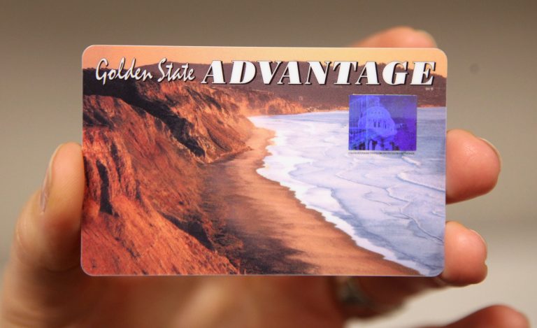 In this photo taken Thursday, Feb. 4, 2010, an Electronic benefit Transfer card, food stamp recipients use to purchase food, is seen at the Sacramento County Economic Development Department in Sacramento, Calif. Shoppers in Illinois and other states were temporarily unable to use their food stamp debit cards because of an outage at the vendor that processes the payments. (AP File)