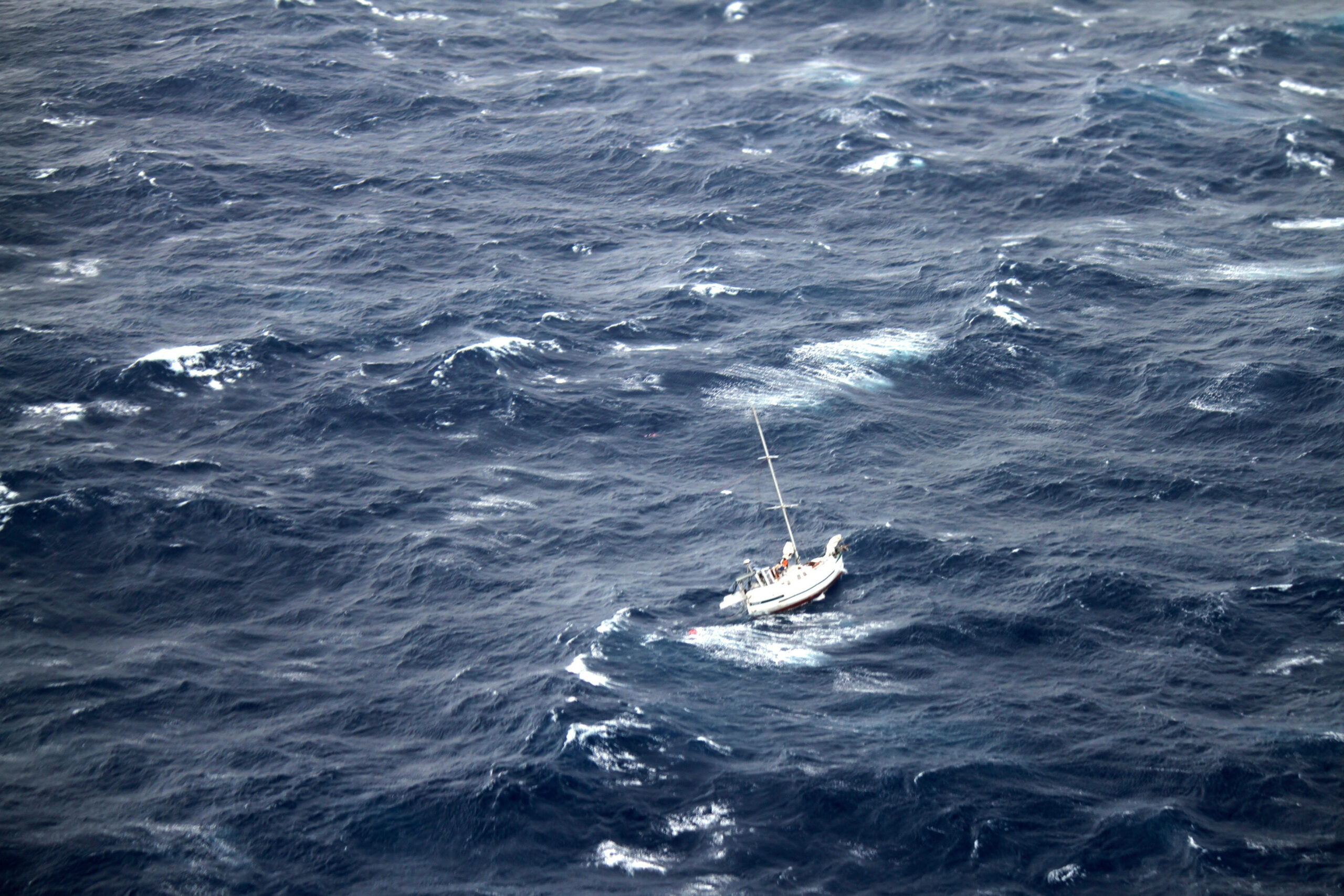 Ship rescues 3 stranded in rough seas off Hawaii