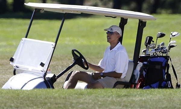President Obama during on his vacation golf outings on Martha's Vineyard, Mass. AP Photo