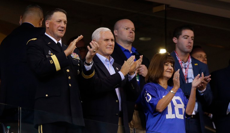 Vice President Mike Pence is winning rave reviews for his decision to walk out of an NFL game between the Indianapolis Colts and the San Francisco 49ers on Sunday, after players kneeled during the national anthem. (AP Photo/Michael Conroy)