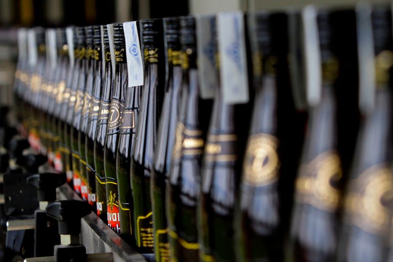   In this Oct 22, 2010 photo, bottles of Havana Club rum move along the assembly line at the company's factory in Havana, Cuba. Time and again U.S. courts have ruled against Cuba in its fight to control the U.S. rights to the trademark Havana Club, the island's flagship rum brand which is sold in more than 120 countries around the world, but not in the United States. By mid-June, Cuba could lose all chance of pressing its legal claims against Bacardi, which distributes a limited quantity of its own Havana Club rum in Florida and says it plans to expand to other states in the near future. (AP Photo/Franklin Reyes)  