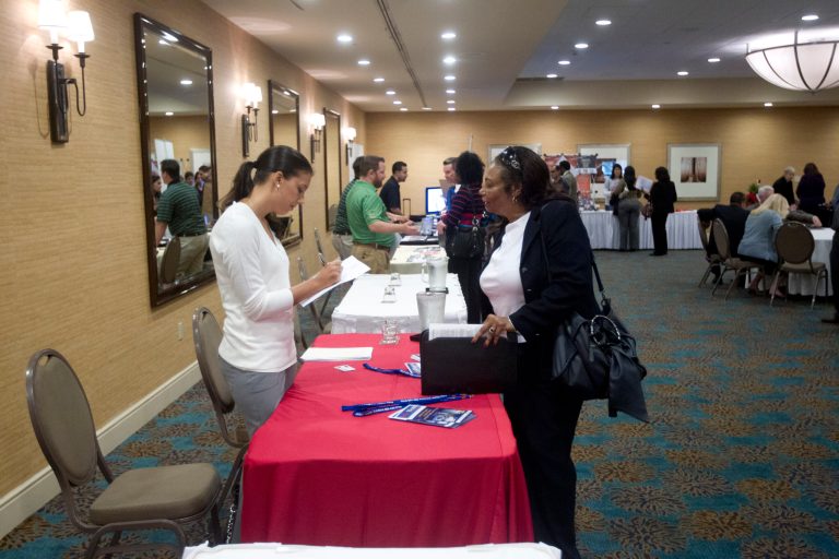   In this Friday, Nov. 30, 2012 photo, a person fills out an application at the Fort Lauderdale Career Fair, in Dania Beach, Fla. The U.S. economy added a solid 146,000 jobs in November and the unemployment rate fell to 7.7 percent, the lowest since December 2008, the Labor Department announced Friday, Dec. 7, 2012. The government said Superstorm Sandy had only a minimal effect on the figures. (AP Photo/J Pat Carter)  