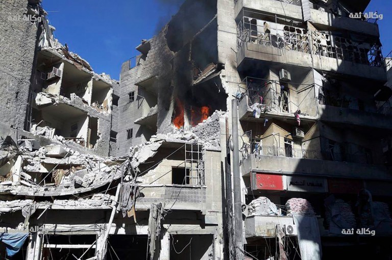 The U.N. said Thursday it's ready and waiting to distribute the aid to about 275,000 people in Aleppo, Syria. (Thiqa News via AP)