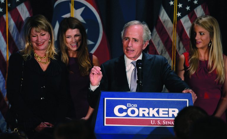 FILE - In this Tuesday, Nov. 6. 2012, photo, Sen. Bob Corker, R-Tenn., is surrounded by, from left, his wife Elizabeth, and daughters Emily and Julia, as he speaks to supporters at an election night victory rally at the Cabana Restaurant on Tuesday, Nov. 6, 2012, in Nashville, Tenn.S enate Republicans would probably agree to increased tax rates on the wealthiest Americans if it meant getting a chance to reform massive government entitlement programs like Medicare and Social Security,Corker said Sunday, Dec. 9, 2012. (AP Photo/Mark Zaleski, File)