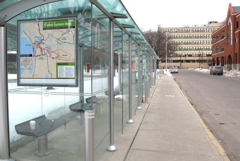 A bus stop in Burlington, Vt., remained unused on Wednesday as a strike by the city's bus drivers continued into a second week, leaving thousands of people scrambling to find ways to get to work, school and appointments. (AP Photo/Wilson Ring)